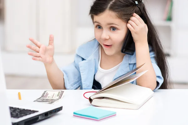 Girl playing role of business woman