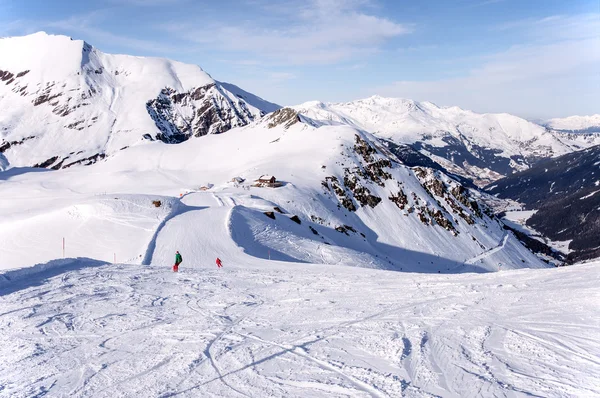 Ski run and hut in Alps