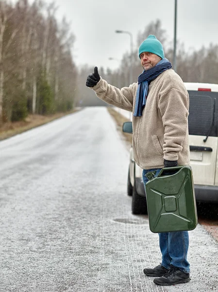 Male and jerrycan