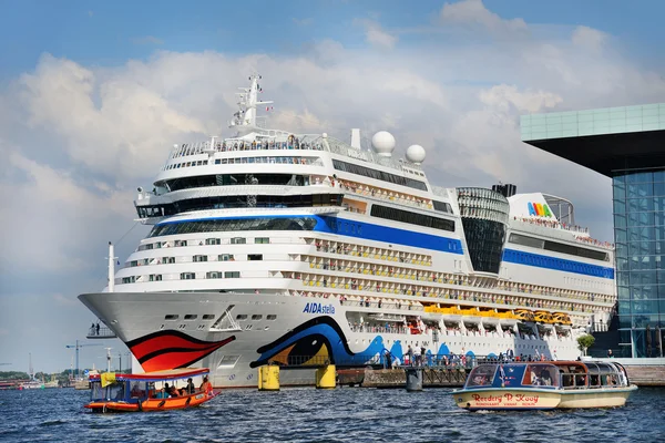 Tourists greetings departing on cruise ship from the port of Ams