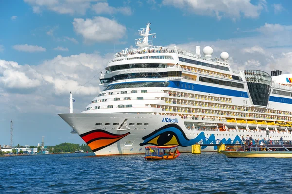 Tourists greetings departing on cruise ship from the port of Ams