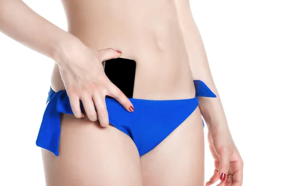 Girl holder phone in briefs