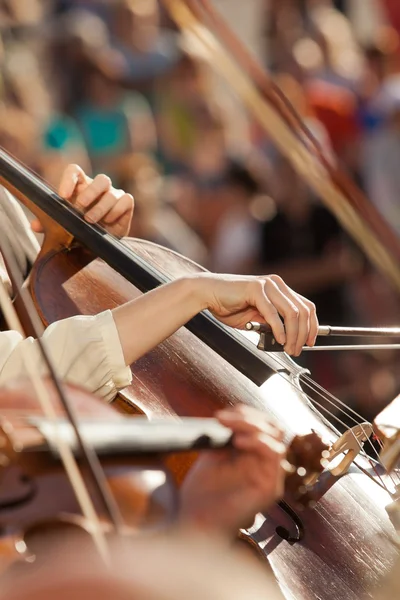 Hands girls playing the cello