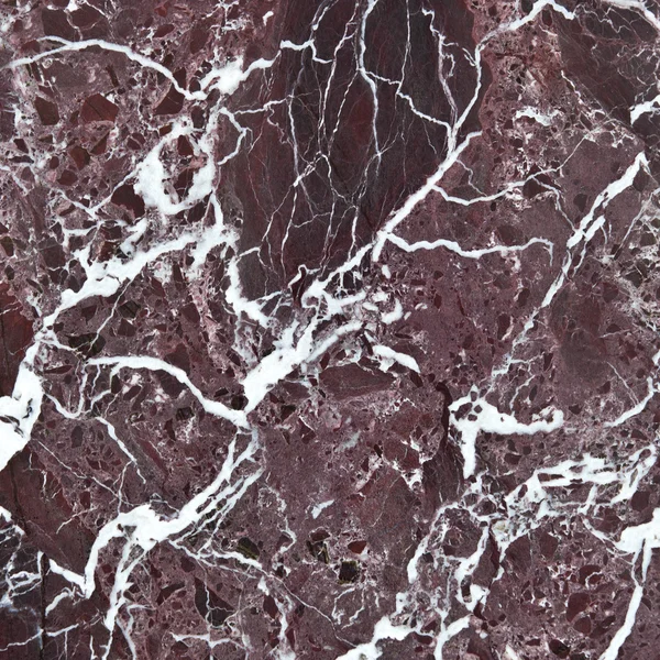 The surface of the marble in the background