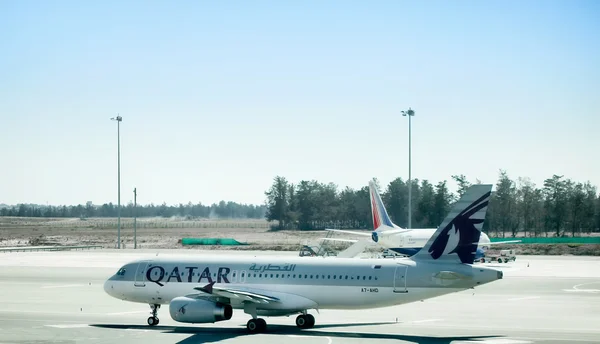 Aircraft Airbus A-320 of Qatar Airways is ready to take off from