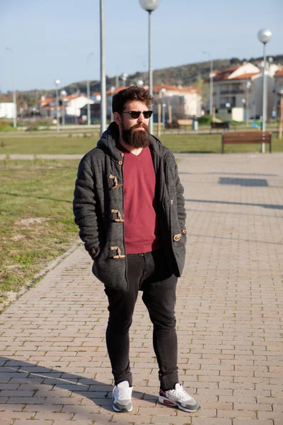 Casual hipster man with long beard