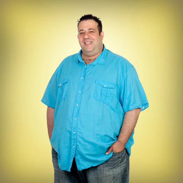 Happy fat man with blue shirt
