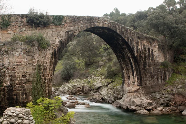 Big bridge with waterfall in Extremadura