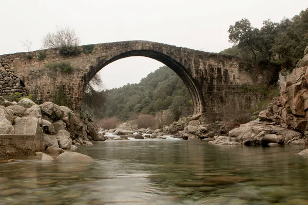 Big bridge with waterfall in Extremadura