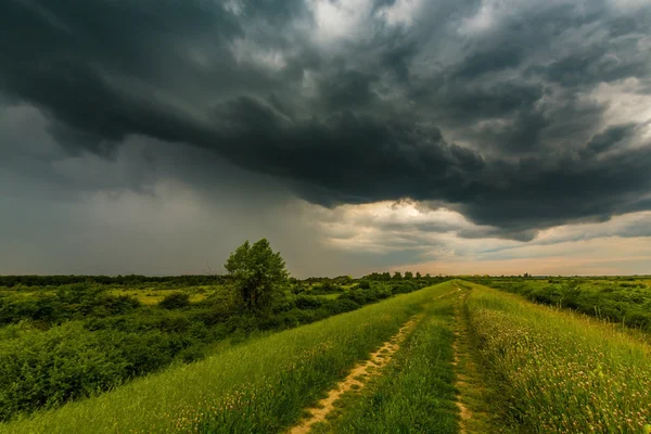 Rural landscape with storm clouds