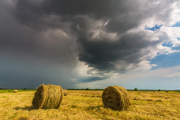 Rural landscape with storm clouds