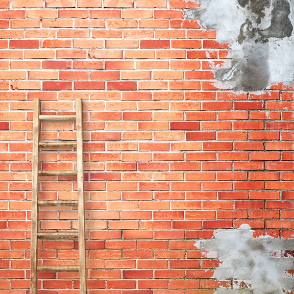 Red brick wall with wooden ladder