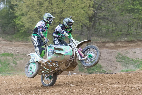 Sidecar is falling to the ground on one wheel