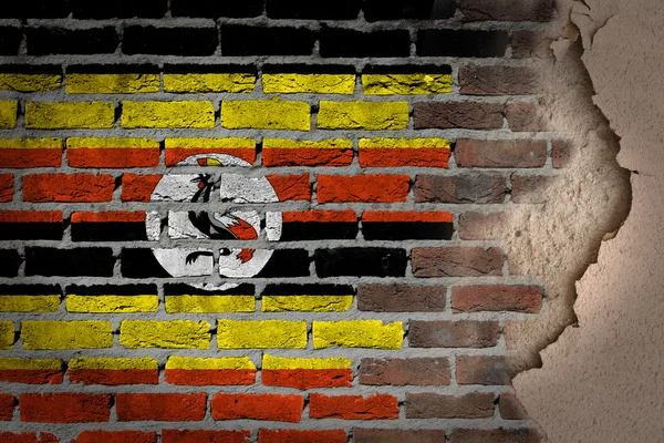 Dark brick wall with plaster - Uganda