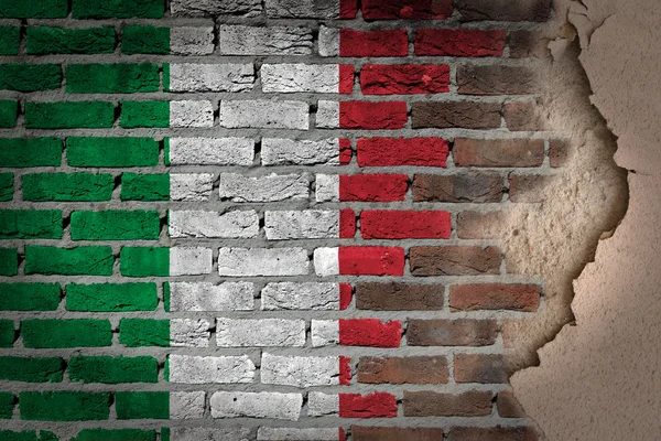 Dark brick wall with plaster - Italy