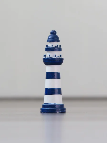 Blue and white striped lighthouse