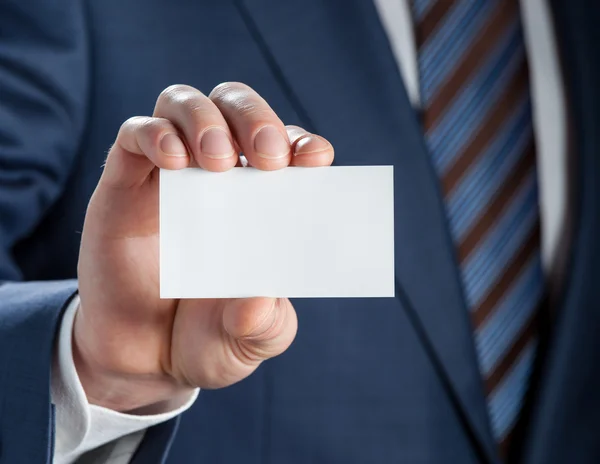 Businessman with blank visit card