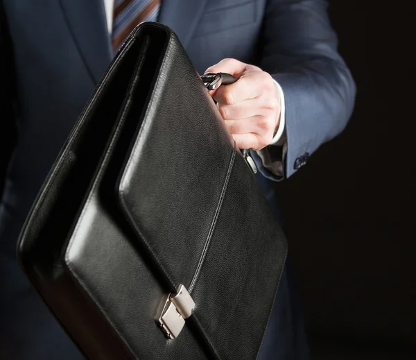 Businessman with leather briefcase