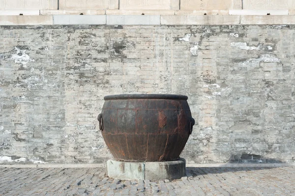 Rusted water vat inside the Forbidden City, Beijing.
