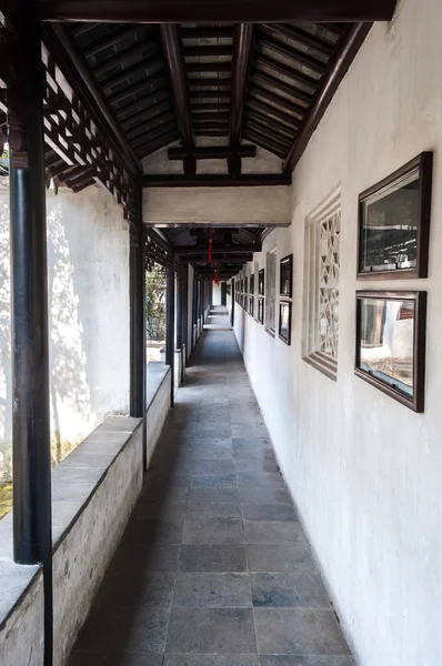 Covered outdoor walkway in the Lion Grove classical garden, Suzhou, China