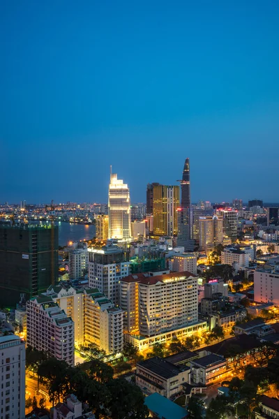 Ho Chi Minh city aeriel view 2015 with new buildings and five star hotels at colorful lights night downtown riverside