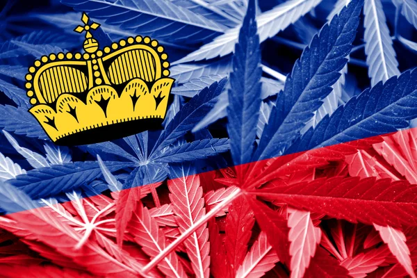 Lichtenstein Flag on cannabis background. Drug policy. Legalization of marijuana