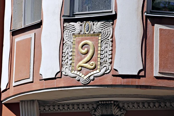 The number two on the facade of a residential building