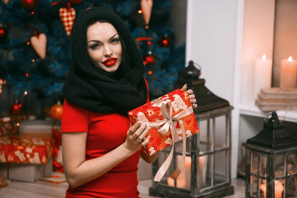 Christmas or New Year Gift.Surprised Woman