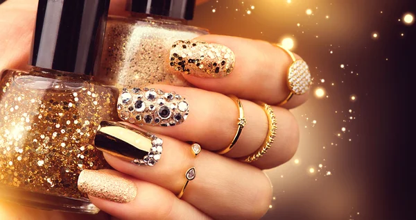 Golden holiday style bright manicure