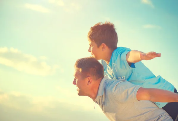 Happy father and son having fun