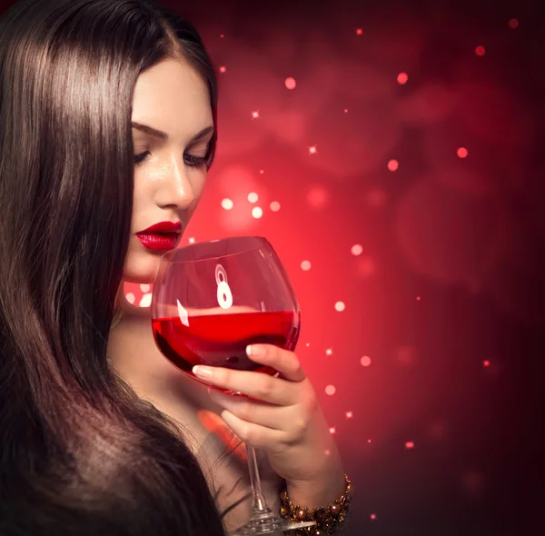 Woman drinking red wine