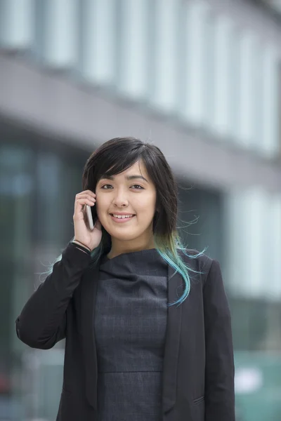 Chinese businesswoman talking  smartphone