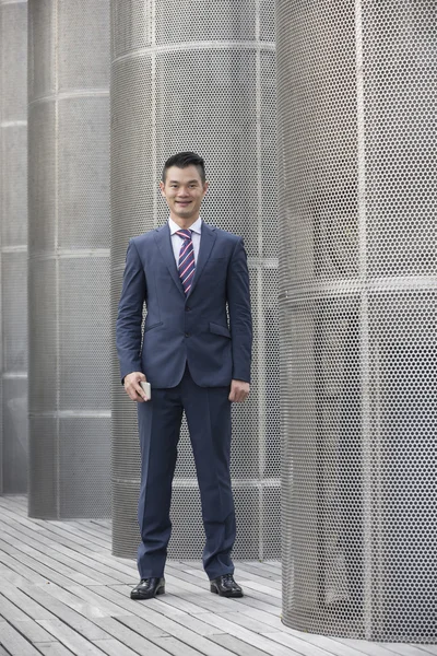 Chinese businessman standing