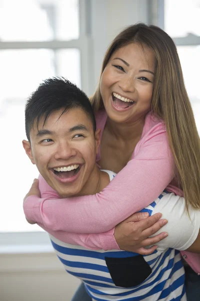 http://st2.depositphotos.com/1499355/12344/i/450/depositphotos_123446138-stock-photo-asian-couple-together-in-living.jpg