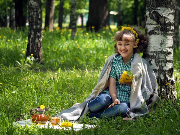 Girl picnic. She laughs