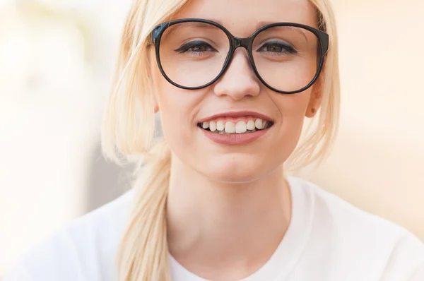 Outdoor portrait of young stylish hipster girl. Close up face, american, blonde, beautiful smile, white teeth, sunglasses, New York, happiness, relax, enjoy summer