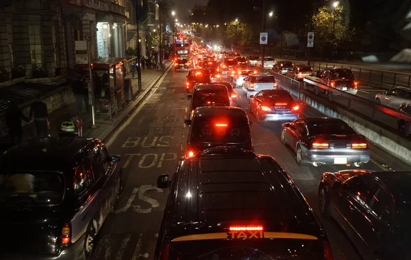 Evening traffic, London city lights