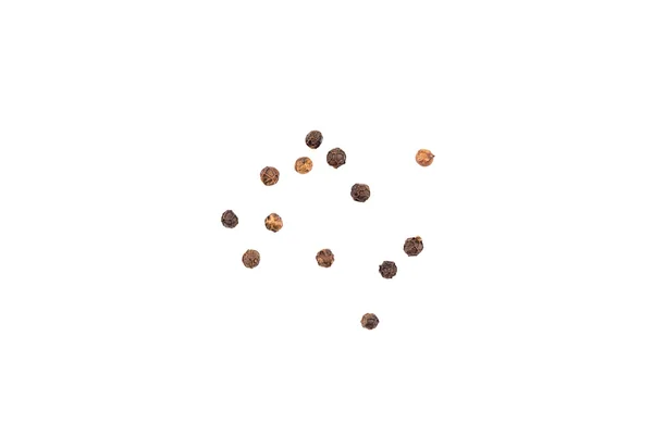 Black pepper seeds on white
