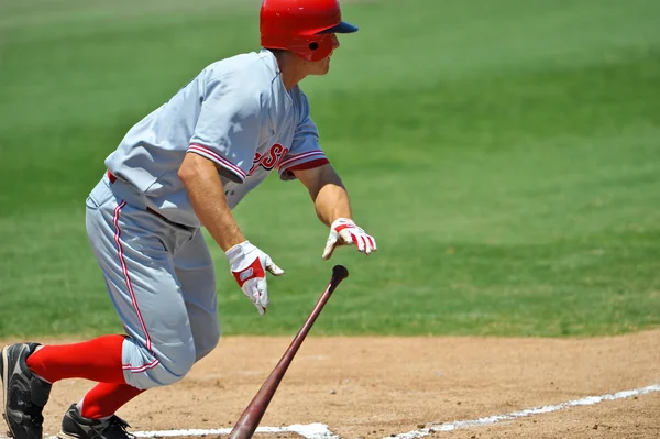 Baseball batter ready to run towards first base