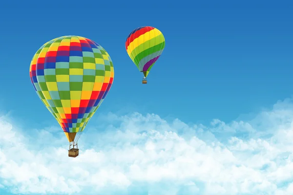 Beautiful Hot Air Balloons against a deep blue sky.