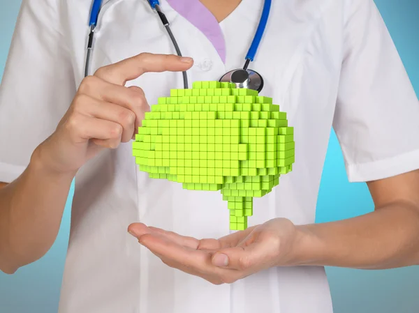 Medicine doctor working with close-up brain voxel