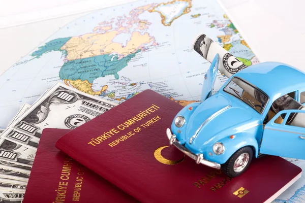 Passport, Toy Car and World Map