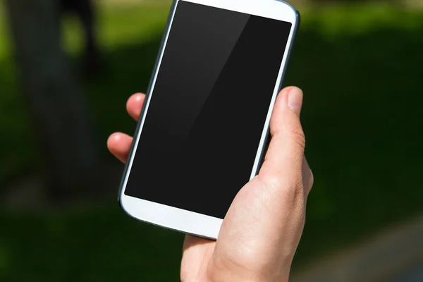 Smart Phone with Black Screen on Natural Background