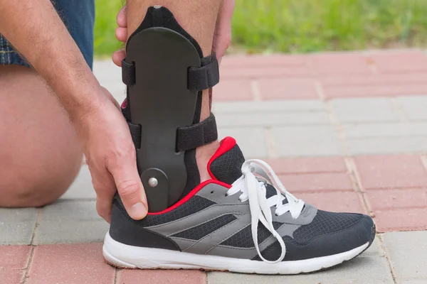 Man wearing ankle brace