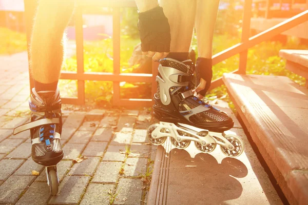 Man rollerblading outdoors