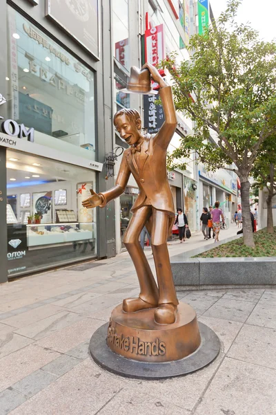 Sculpture of a man Lets Shake Hands in Busan, Korea
