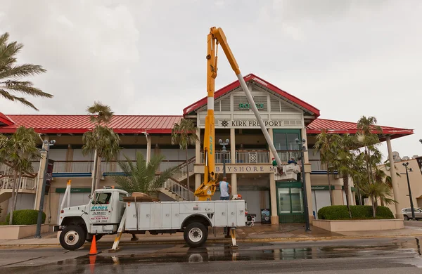Washing of facade of trade center in Grand Cayman