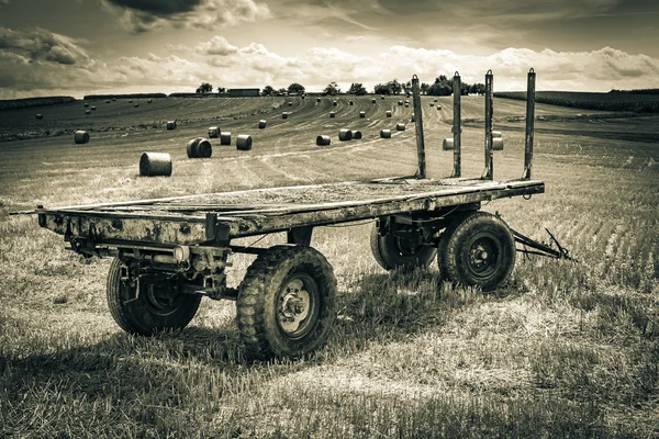 Empty trailer on the field