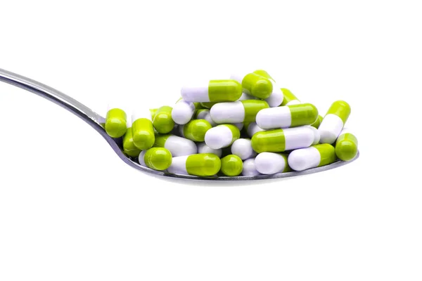 Spoon with capsules Greens