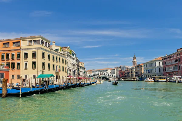 Gondolas moored near Rialto bridge. Venice, Italy